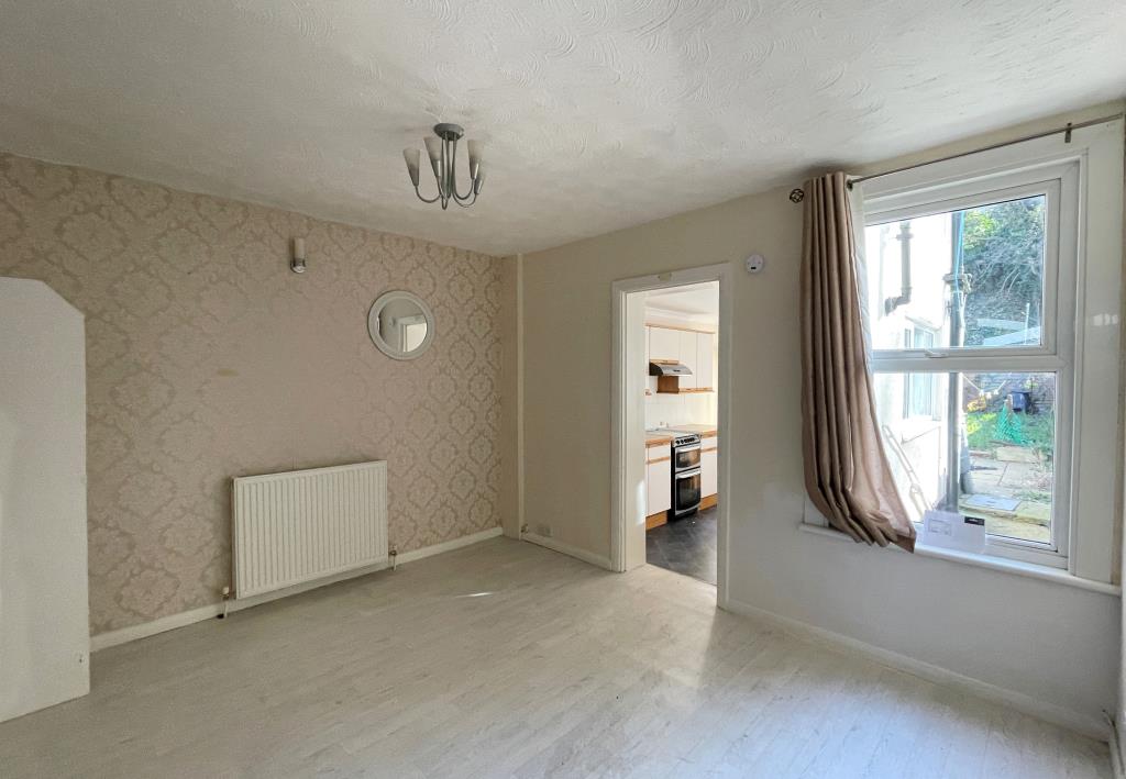 Lot: 1 - THREE-BEDROOM MID-TERRACE HOUSE - Dining room with view of garden